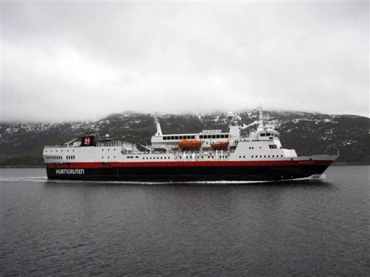 The Hurtigruten's MS Vesteralen cruise ship is seen in May 2010 from Trollfjord, Norway. Hurtigruten prides itself as "the anti-cruise ship" line. 